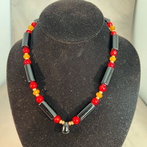 Onyx Necklace with Gold, Coral and Topaz accent colors. 19” Choker. Hook Clasp.